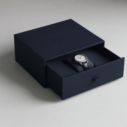 Navy blue watch box with leather strap, drawer gift boxes.