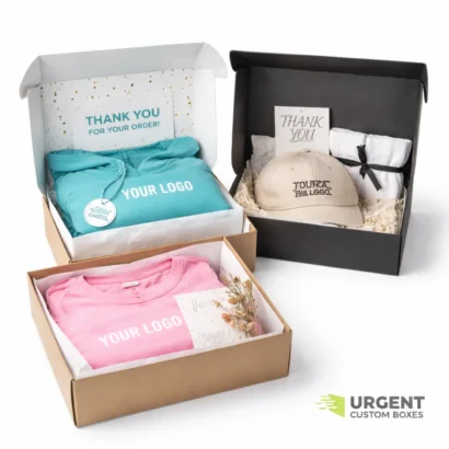 Custom apparel gift boxes with clothing items and logo