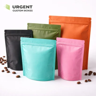 Five matte Mylar bags in different colors on a white background with coffee beans