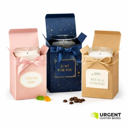 Three candle gift boxes with Urgent Custom Boxes logo