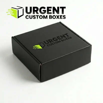 Premium matte black custom mailer box featuring the Urgent Custom Boxes logo and professional shadow