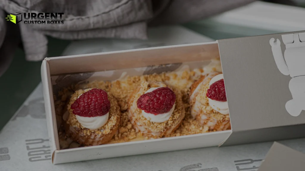 Premium raspberry tarts inside a custom slide-out sleeve bakery box