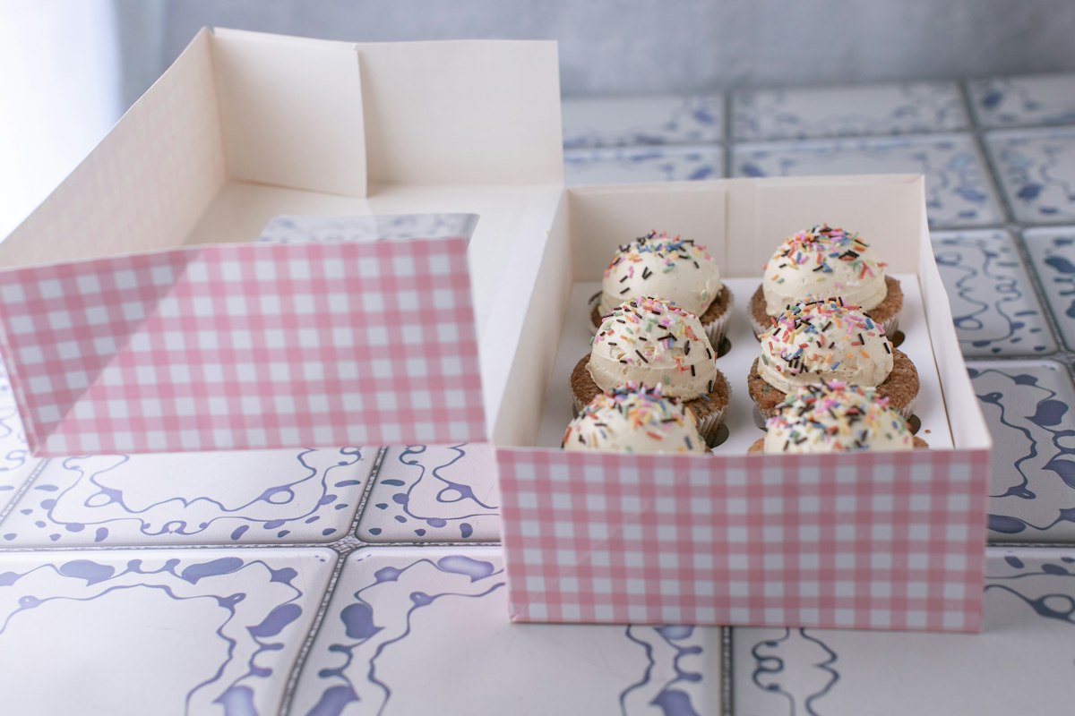 Cupcakes held upright in a box for transport