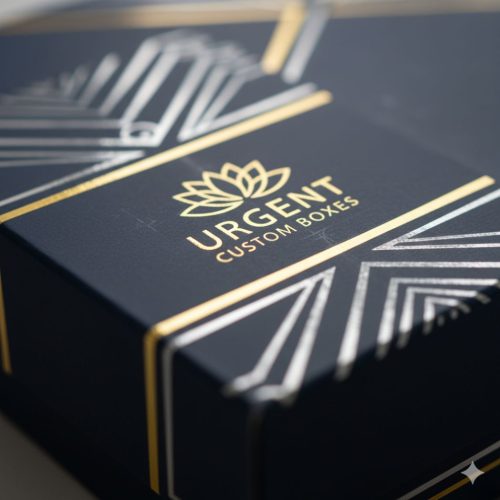 Macro close-up of cold foil logo on box